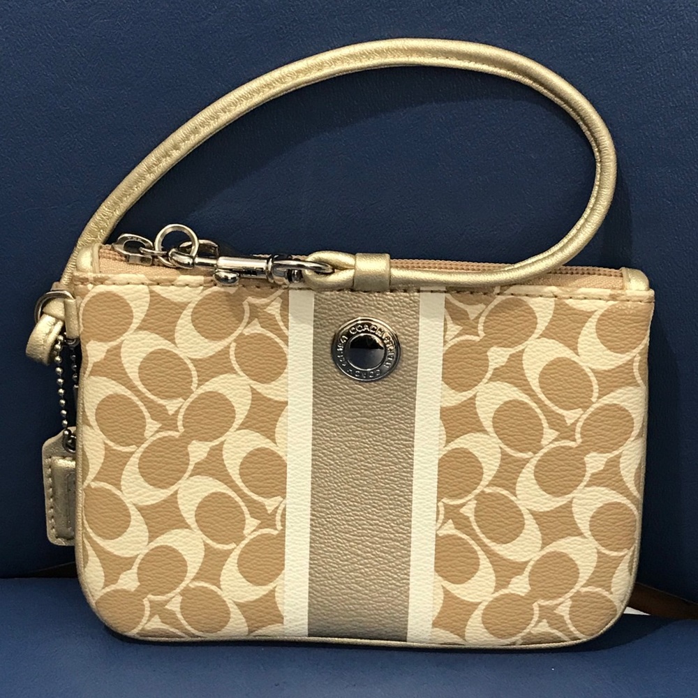 Coach beige/cream/gold sig C leather wristlet